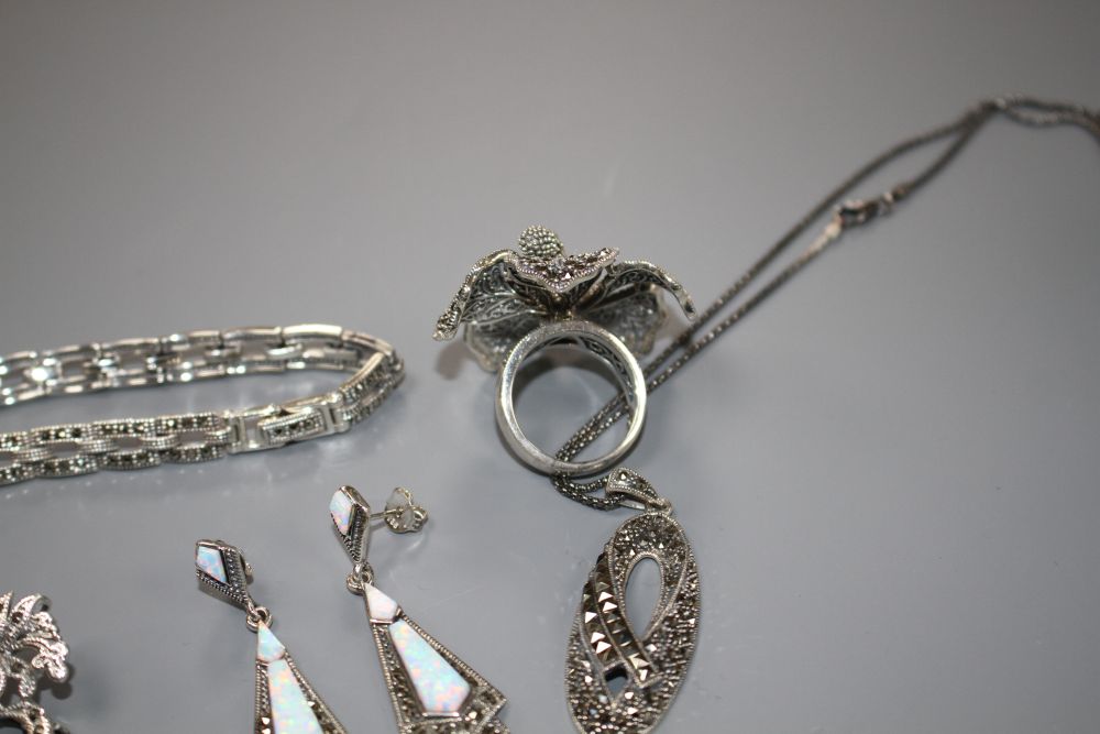 Six assorted items of marcasite jewellery including a pair of earrings, ring, brooch, bracelet and a Gianni Vecci ladys watch.